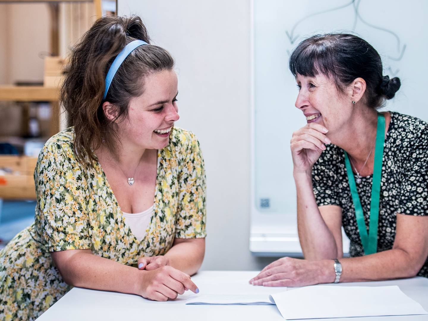 Two female colleagues talking